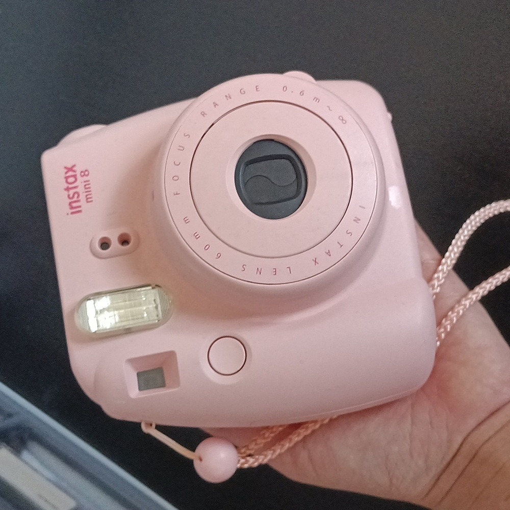 Pink Instax mini 8 Polaroid camera